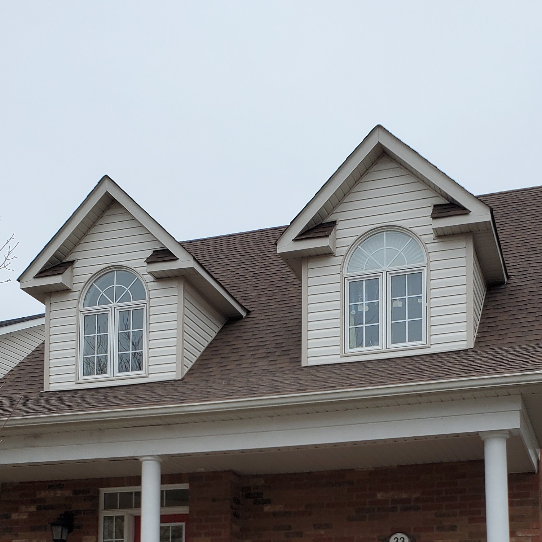 Vinyl siding on upper dormers